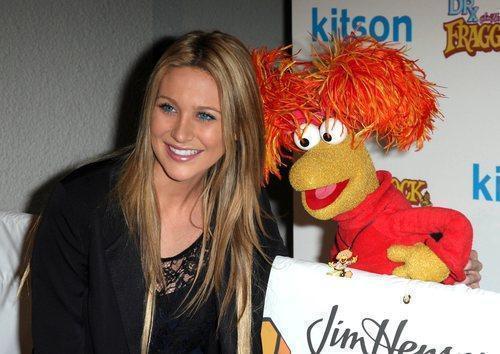So Stephanie Pratt was taking a picture with Red from Fraggle Rock at Kitson